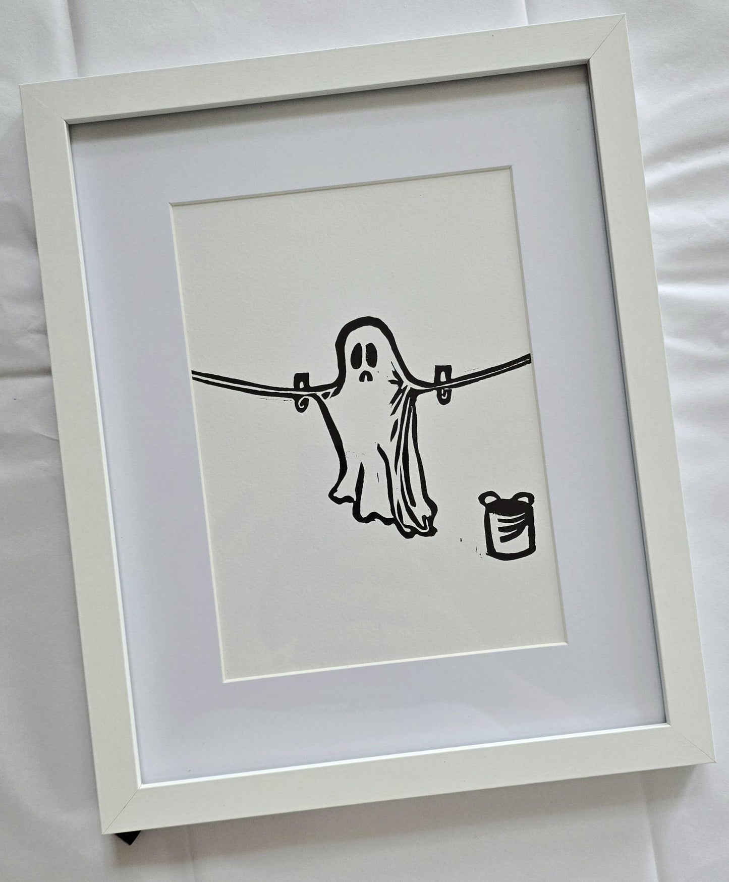 SadCuteGhost | Original | Linoprint |  on a washing line.