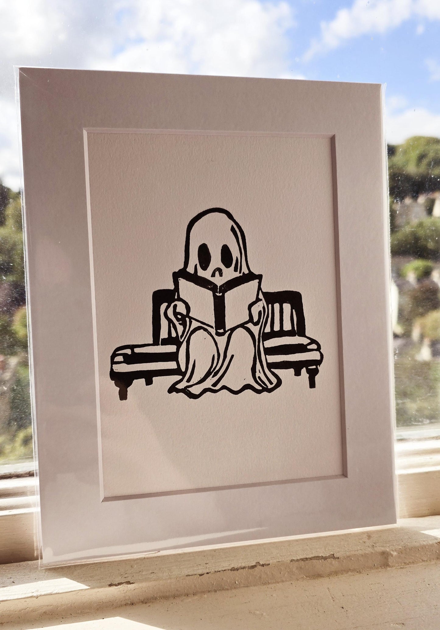 SadCuteGhost | Original | Linoprint |  reading on a bench