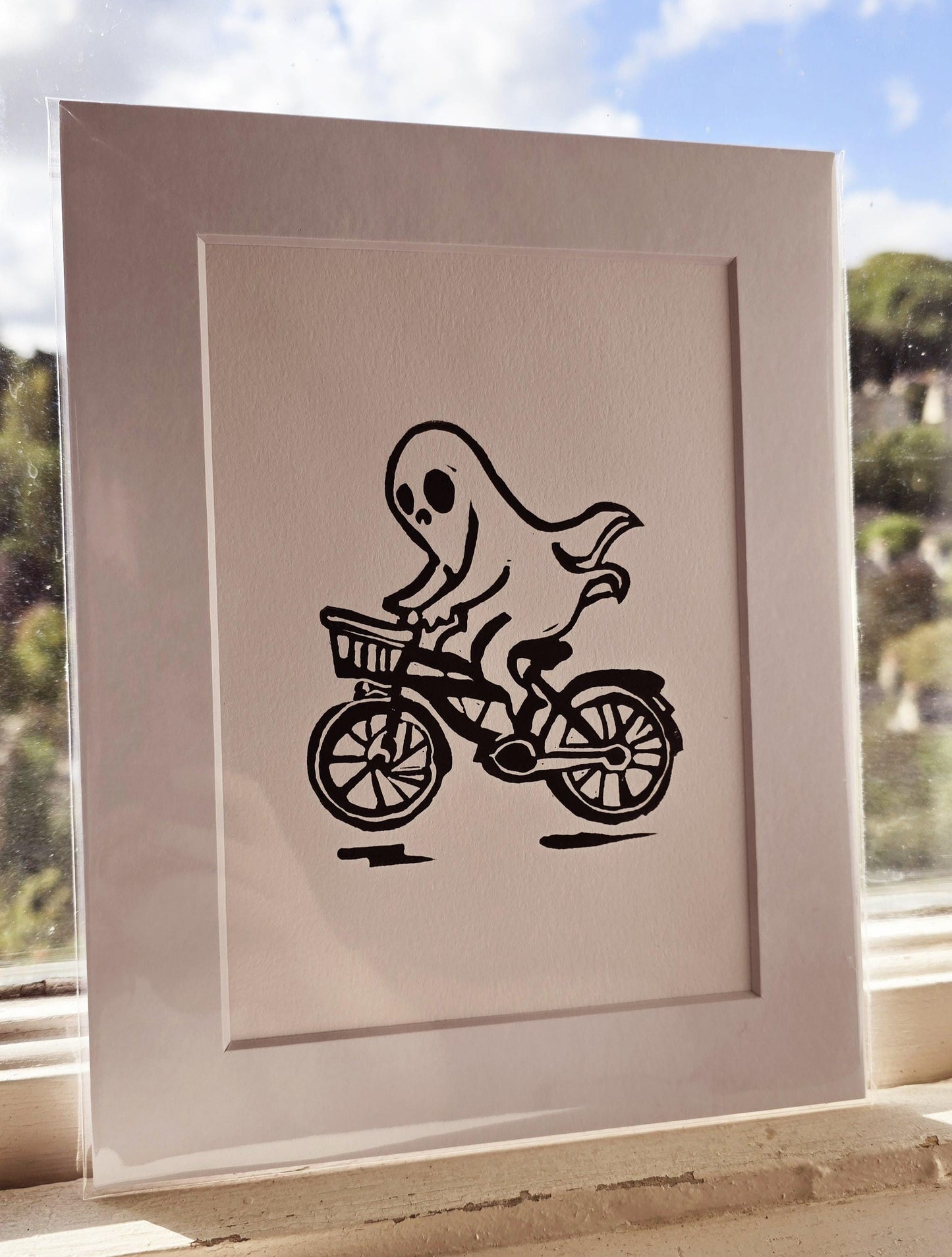 SadCuteGhost | Original | Linoprint |  on a bicycle